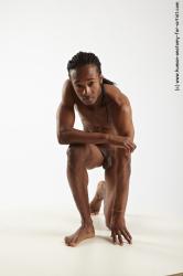 Nude Man Black Kneeling poses - ALL Athletic Kneeling poses - on one knee Black Dreadlocks Realistic